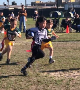 young athlete Chase Bradley sprinting during training session